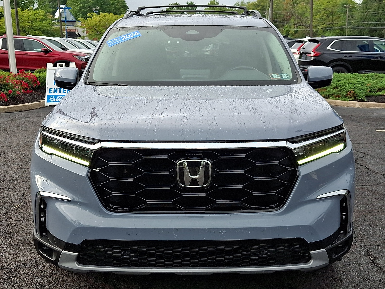 2024 Honda Pilot AWD TRG — photo 1 of 6
