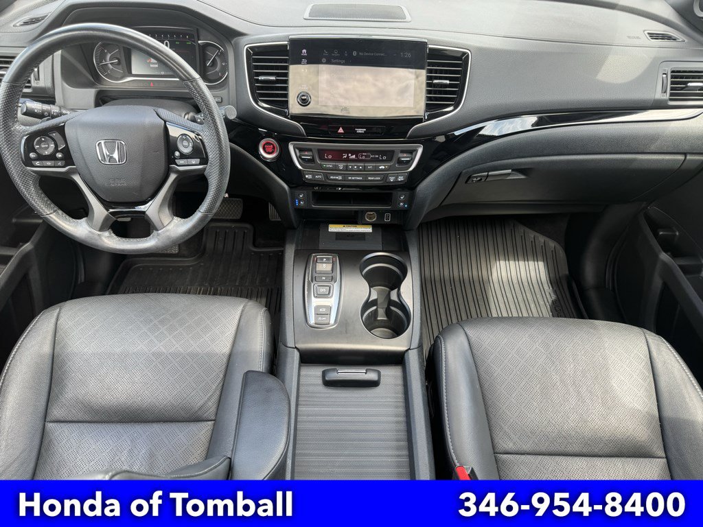 2023 Honda Passport AWD ELITE — photo 1 of 6
