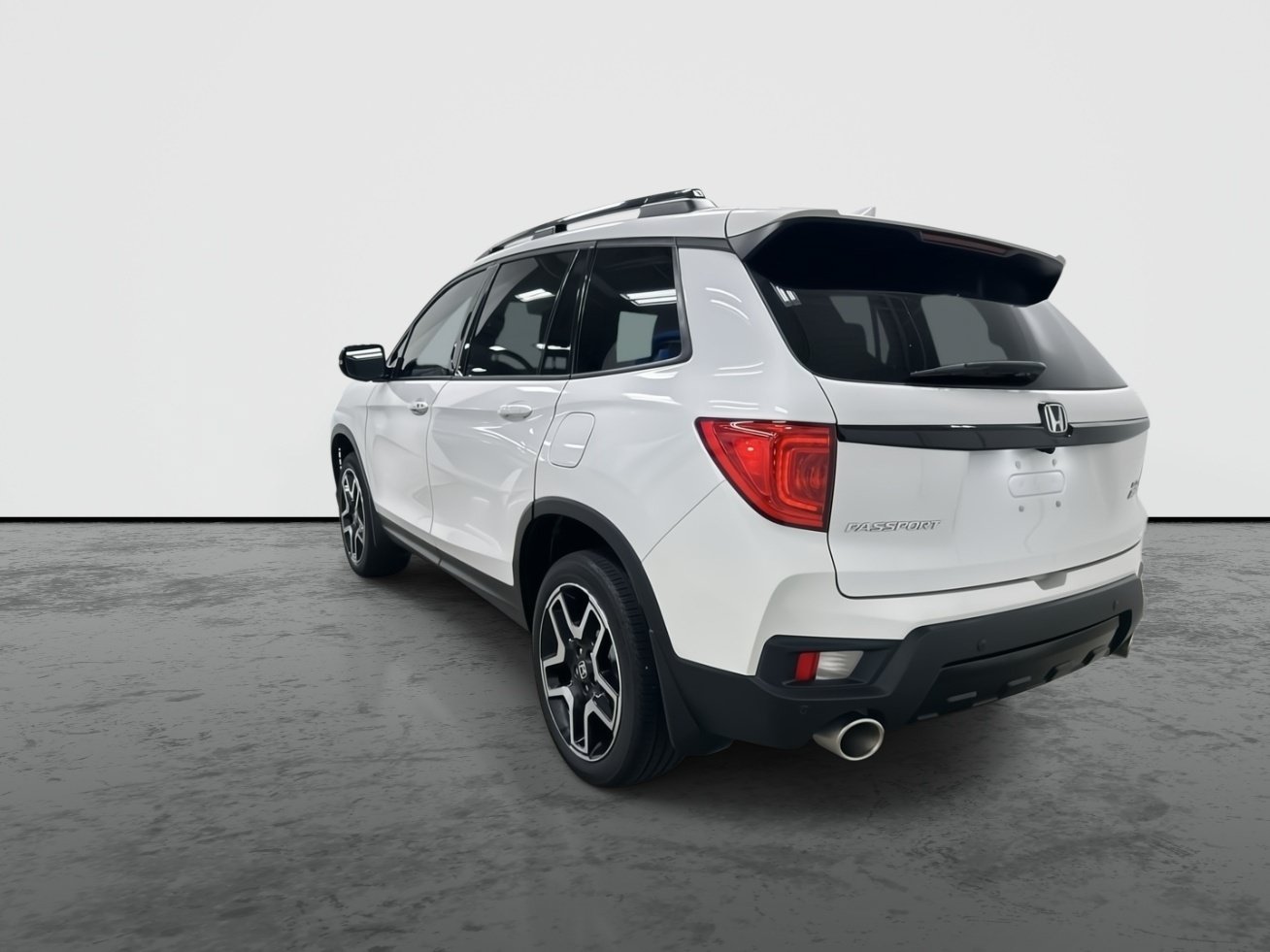 2023 Honda Passport AWD ELITE — photo 1 of 6