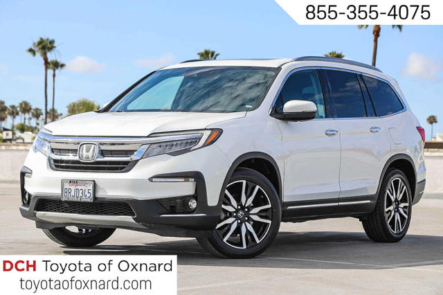 2020 Honda Pilot Touring FWD with Rear Captain'